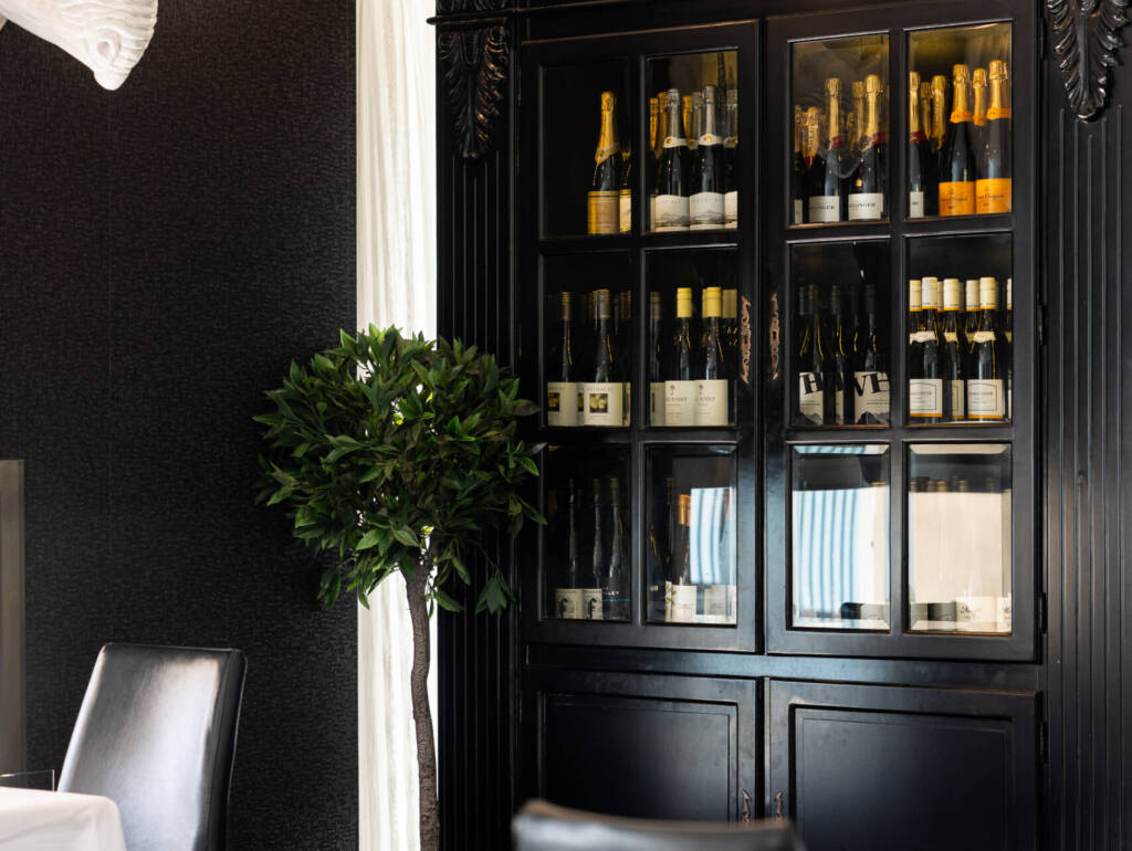 Stylish Hotel restaurant setting and wine cellar at The Regent Room at Regent of Rotorua